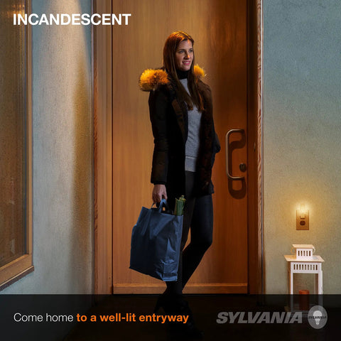 Woman standing in doorway with warm lighting from incandescent C7 night light bulb, showing cozy home atmosphere.