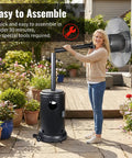 Woman assembling Heavy Duty 50000 BTU Outdoor Propane Patio Heater On Wheels in garden