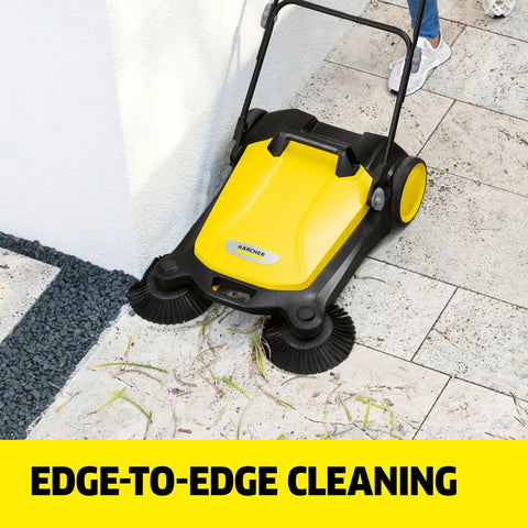 Walk Behind Outdoor Push Sweeper S 4 Twin for Workshops and Garages Cleans Up to 5 Times Faster Than a Broom, shown in use on patio.