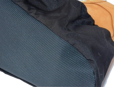 Close-up of non-slip sole on black nylon shoe cover, part of two pairs non slip waterproof reusable shoe covers for contractors.