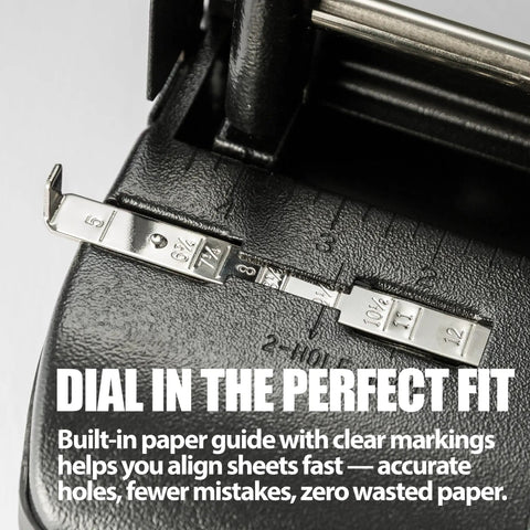 Close-up of adjustable 2 or 3 hole punch with built-in paper guide for precise hole alignment in black office tool.