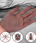 Hand holding black netting showing Ultra Large Mosquito Net Bed Canopy For Full Queen King Size Beds Indoor Outdoor Black Curtains And Drapes Patio Gothic Room Decor Screen Netting Canopy For Bed Frame.