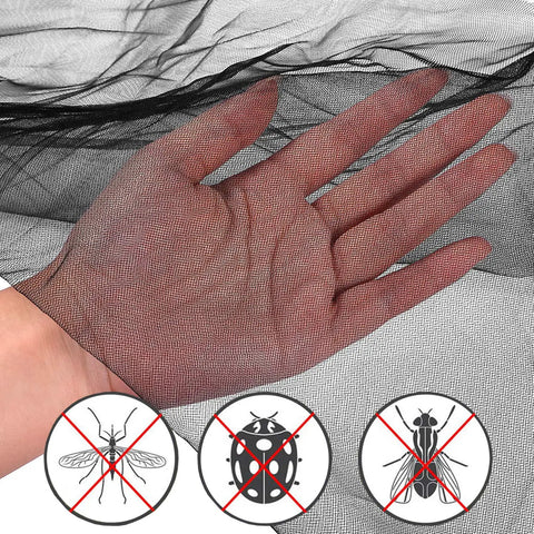 Hand holding black netting showing Ultra Large Mosquito Net Bed Canopy For Full Queen King Size Beds Indoor Outdoor Black Curtains And Drapes Patio Gothic Room Decor Screen Netting Canopy For Bed Frame.