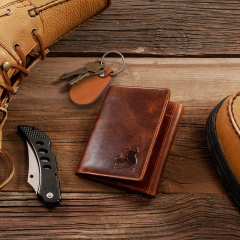 Rugged Leather Mens RFID Blocking Trifold Wallet With Double Cash Compartments Secret Pocket Top Grain Forest Brown on wood