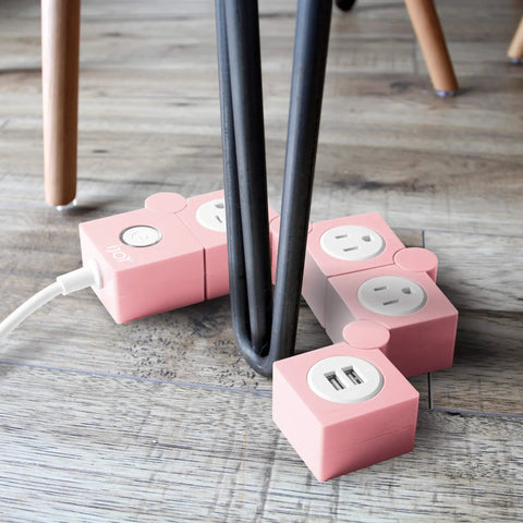Pink Power Strip With Surge Protection, 3 AC Outlets And 2 USB Ports, Flexible Twist Design For Desk Or Floor, shows twist
