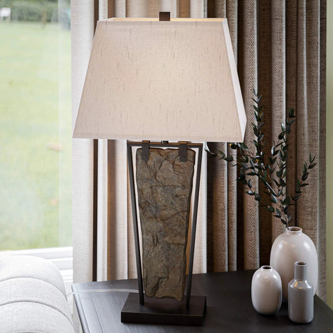 Natural Slate Finish Rustic Table Lamp With Oil Rubbed Bronze Accents, Alexa Compatible, on a dark wood surface, beside ceramics