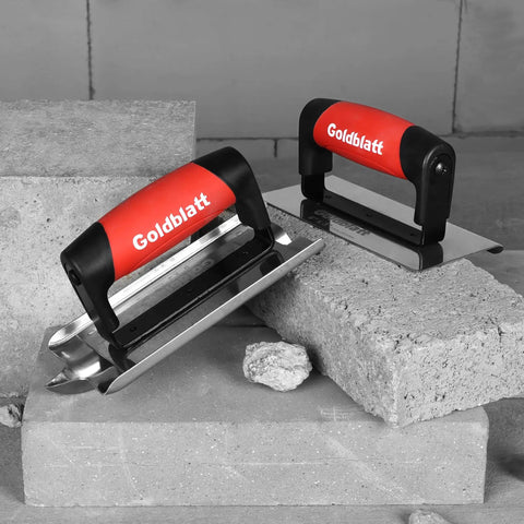 Pro Grade Stainless Steel Concrete Edger And Groover Tool Set With 6 Inch Edger And 6 Inch Groover on concrete blocks