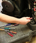 Seven Piece SAE Nut Driver Set With Chrome Vanadium Steel Blades And Acetate Color Coded Handles Ideal For Automotive DIY And Mechanical Projects Rust Resistant ANSI Rated Tools used in engine repair.