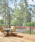 Outdoor String Light Poles 9 Ft Two Function Poles With Fork Bases And Fence Brackets 2 Pack on wooden deck