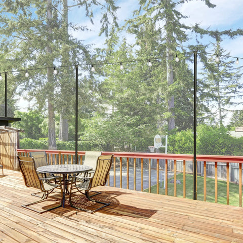 Outdoor String Light Poles 9 Ft Two Function Poles With Fork Bases And Fence Brackets 2 Pack on wooden deck