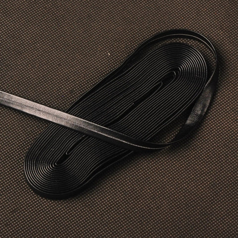 4.4 Yard Synthetic Leather Ito Tsukamaki Sageo Cord For Katana Wakizashi Tanto, black cord on textured surface