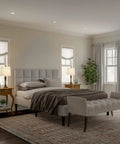 Cozy bedroom with set of 2 mid-century modern table lamps with metal flared trumpet bases in bronze finish, LED bulbs illuminating space.