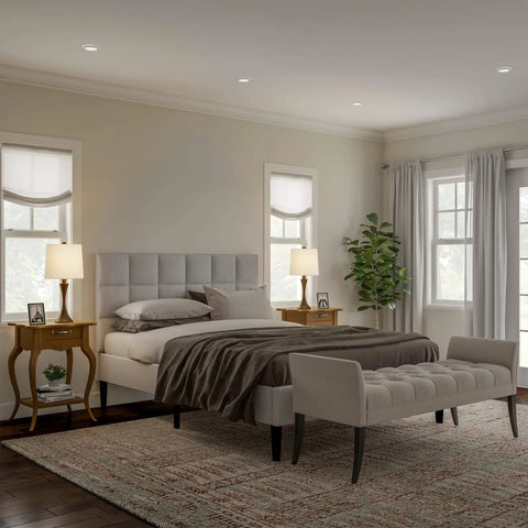 Cozy bedroom with set of 2 mid-century modern table lamps with metal flared trumpet bases in bronze finish, LED bulbs illuminating space.