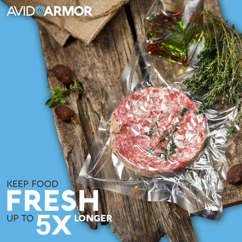 Chamber Vacuum Sealer Pouches Set Pro Grade 3.5 Mil Heavy Duty BPA Free Bags with frozen meat on wooden board