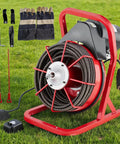 Heavy Duty Electric Drain Snake Cleaner With 75 Foot Steel Core Cable And 400W Motor showing cable reel, gloves, and attachments on grass.
