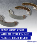 Top-down view of a four-piece rear drum brake shoe set with brown metal bodies and dark friction lining.