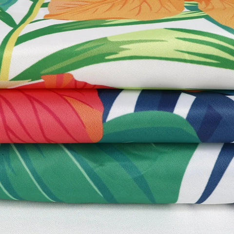 Close-up view of Elastic Edge Square Fitted Tablecloth With Tropical Palm Leaves Card Table Cover For Outdoor And Indoor Use Wipeable Polyester Fits 34x34 Or 36x36 Inch Card Tables For Chill Kitchen Decor showing fabric detail.