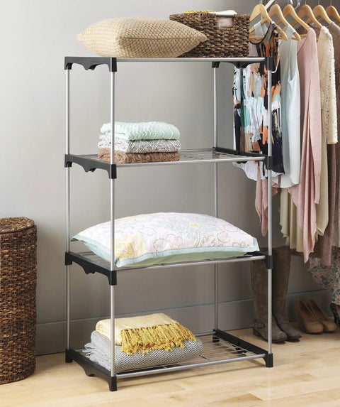 Four Tier Closet Tower Organizer Freestanding Storage Unit For Clothes And Shoes with folded linens on metal shelves