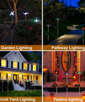 Night scene of Six Pack Solar Garden Stake Lights with Color Changing LEDs in garden, pathway, yard, and festive settings.