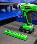 36 Piece Magnetic Hex Bit Holder Kit for fast drill bit storage with strong magnetic retention in use with a green drill.