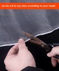 Close-up of scissors cutting Insect And Bird Barrier Garden Netting 20 X 10 Feet Easy Cut Plant Cover, showing flexible mesh.