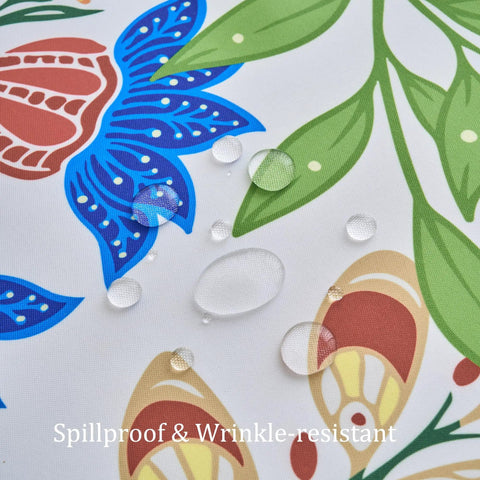 Close-up of spillproof and wrinkle-resistant 60 Inch Round Outdoor Tablecloth With Umbrella Hole And Zipper in paisley design