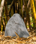 Outdoor Natural Arrow Rock Decor For Lawns And Gardens, Weatherproof Fiberglass Yard Accent amid bamboo