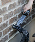 Applying Outdoor Pipe Wrap Tape 2 Inch By 50 Feet UV Resistant With Strong Adhesive Backing to outdoor pipe against brick wall