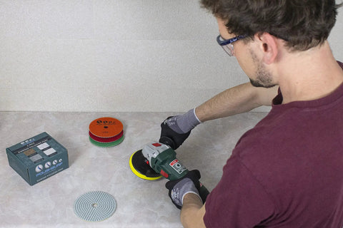 Man using 5 Inch Diamond Polishing Pads Wet Dry Set For Quartz Marble Granite Concrete Countertops Includes Grit 50 100 200 400 800