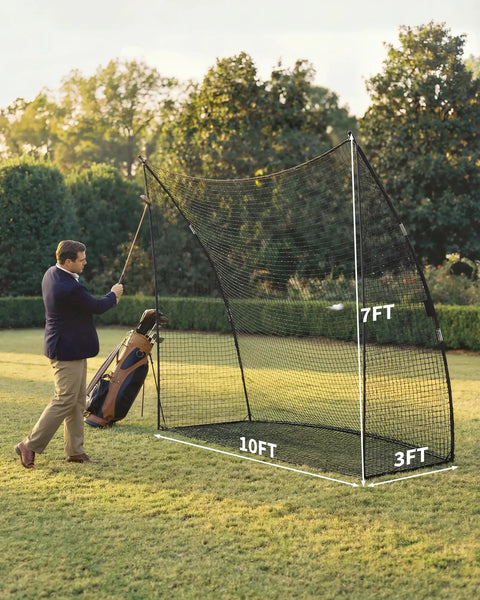 Man practicing golf swing using Heavy Duty Golf Practice Net 10x7 Feet with Sturdy Frame and Quick Setup in backyard lawn.
