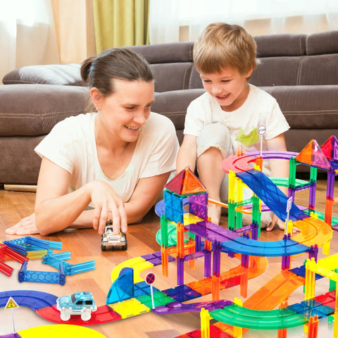Parent and child playing with 12 Piece Magnetic Support Column Expansion Pack For Race Track And Marble Run Builders