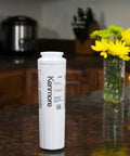 Upgrade Your Water Game 9084 Refrigerator Water Filter For Select Side By Side And Bottom Freezer Fridges White on countertop