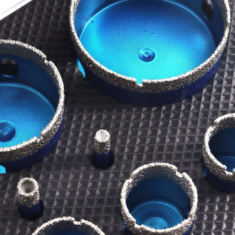 Close-up of diamond core drill bits set, 11 pcs with triangle shanks, sizes 6–65 mm for tile and stone drilling