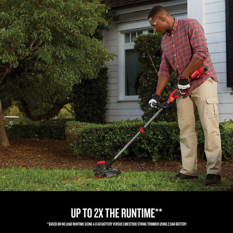 Man using Cordless Weed Wacker String Trimmer With QuickWind Spool 4 Ah Battery 13-In Cut trimming grass by hedge