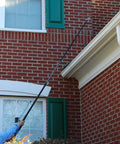 User utilizing Slick Heavy Duty Telescopic Video Inspection Camera With Built In Dvr Recording And Bright Five Inch Lcd Screen to inspect roof.
