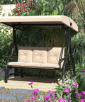 3-Seater Outdoor Porch Swing With Adjustable Backrest And Canopy in garden setting, beige cushions visible