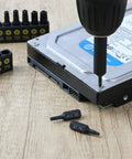 Heavy Duty 15 Piece Torx Bit Set T4 Through T40 Tamper Proof Security Star Bits 1/4 Inch Hex Shank used on a hard drive.