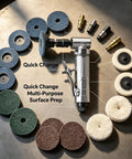 1/4 Inch Angle Air Die Grinder Badass Heavy Duty Tool With 22 Piece Quick Change Sanding Kit on a workbench with various discs.