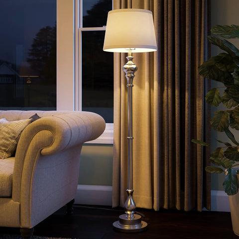 Tall Brushed Steel Floor Lamp With Classic Style, 59 Inch Height, 15 Inch Drum Shade, in a cozy living room setting