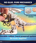 Ukrainian Ironbelly Dragon 3D Wooden Puzzle For Adults, Mechanical Model Kit With Flapping Wings, Movable Head And Tail, DIY Building Craft, Brain Teaser Puzzle, Collectible Book Design, Epic Gift For Puzzle Lovers. Close-up of dragon mechanism and coins.