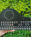Hand holding a Hands On Soldering Practice Kit For Beginners And Hobbyists A DIY Electronics Project Learning Board outdoors