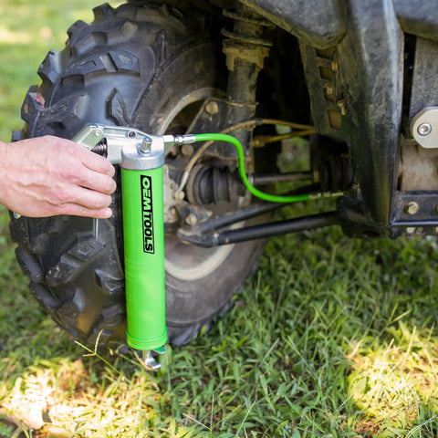 Using Beefy Pistol Grip Grease Gun Kit With 18 Inch Hose And Coupler Flexible Hose For Auto And Shop Use 6000 PSI on a vehicle