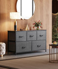 Five Drawer Fabric Dresser For Bedroom And Closet Storage, Wide Chest Of Drawers With Fabric Bins, Dark Grey in living room setting.