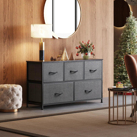 Five Drawer Fabric Dresser For Bedroom And Closet Storage, Wide Chest Of Drawers With Fabric Bins, Dark Grey in living room setting.