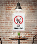 No Trolley Symbol 8 By 12 Warehouse Equipment Restriction Sign displayed on rustic brick wall setting.
