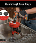 Person using Power Spinner Drain Cleaner With AutoFeed Self Feed Cable For Drill Powered Operation Up To Five Hundred RPMs Kink Resistant MaxCore Cable Cleans From Three Quarter Inch To One And One Half Inch Drain Lines on a kitchen sink