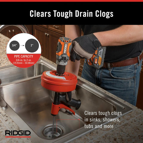 Person using Power Spinner Drain Cleaner With AutoFeed Self Feed Cable For Drill Powered Operation Up To Five Hundred RPMs Kink Resistant MaxCore Cable Cleans From Three Quarter Inch To One And One Half Inch Drain Lines on a kitchen sink
