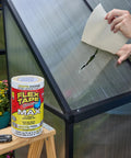 Person applying thick rubberized waterproof tape that seals leaks fast and holds up under water. White 12 inch by 10 foot pack of 1 shown.