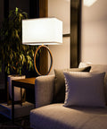 Oke Table Lamp With Gold Plated Finish, Modern Art Deco Open Round Frame, White Rectangular Shade in living room setting