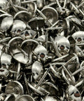Pro Shop Grade Silver Finish Upholstery Tacks 7 16 Inch Round Heads 500 Piece Set For Furniture Repair leather couch detail and DIY woodworking built different for pros, close-up of silver tacks.